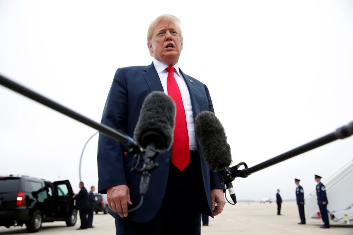 Donald Trump talks to reporters prior to departing Washington en route Houston, Texas from Joint Base Andrews, Maryland, U.S., May 31, 2018. 