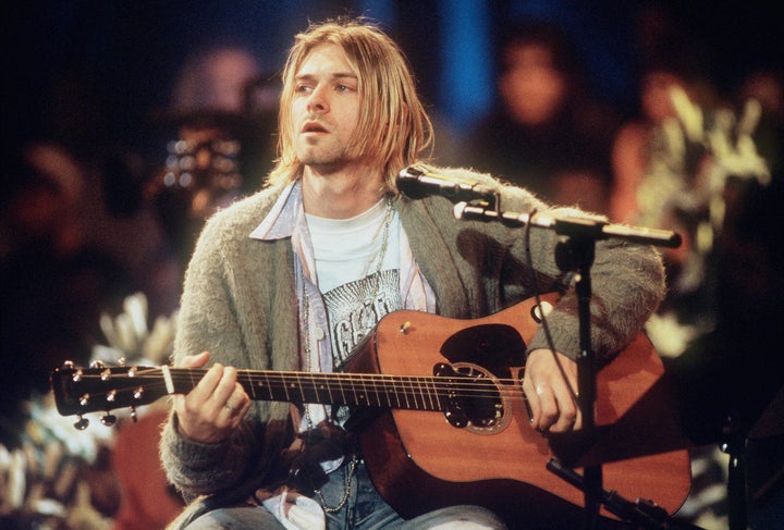 Kurt Cobain playing his 1959 Martin D-18E guitar, which is thought to be worth millions of dollars, during Nirvana’s “MTV Unplugged” concert in November 1993.