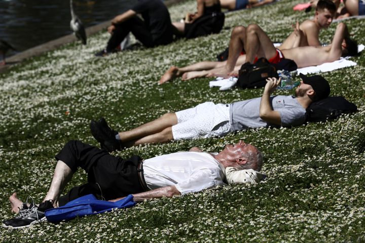 People sunbath in London's Regent's Park in May 2018