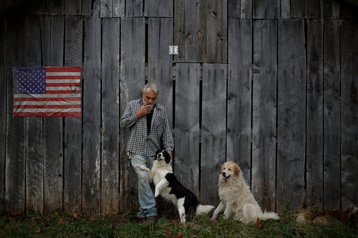 Jeff Fletcher, standing near his mobile home in Jackson, Kentucky, was uninsured until he enrolled in Obamacar