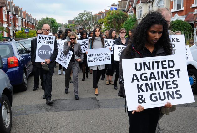 Friends and family of Lewis Elwin, who was fatally stabbed in Tooting in April, stage an anti-knife crime march 