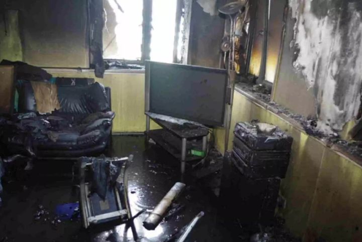 The TV and sofas remain in place, despite the deadly blaze 