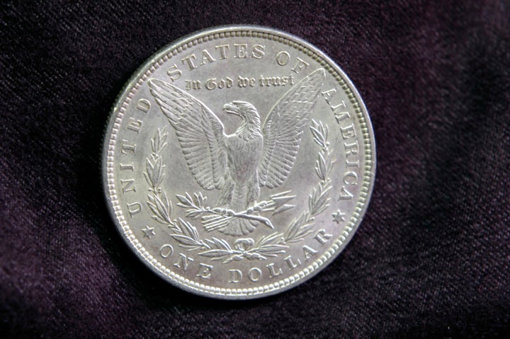 A silver dollar from 1887. “In God we trust” started appearing on U.S. coins in 1864, partly in reaction to the Confederacy’s declaring itself a Christian nation.