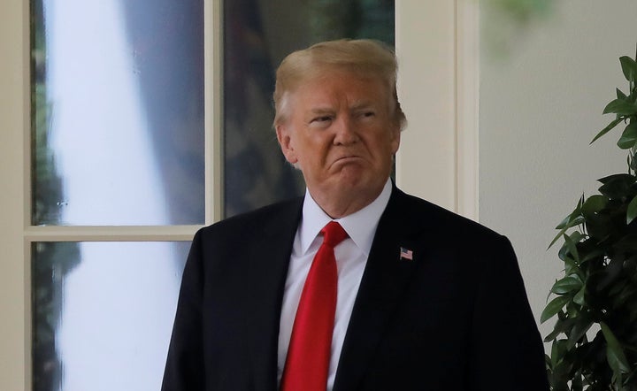 President Donald Trump revoked the invitation over players' disagreement with his national anthem position.