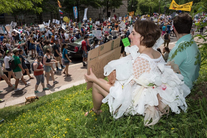 Kathryn Ravey of Falls Church, Virginia, calls for a plastic bag tax at the People's Climate March in Washington, D.C. in April 2017.