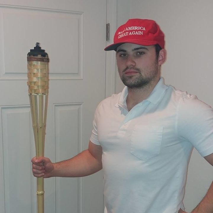 James Allsup uploaded a photo to Facebook in which he holds a tiki torch like the ones used during the "Unite the Right" rally.