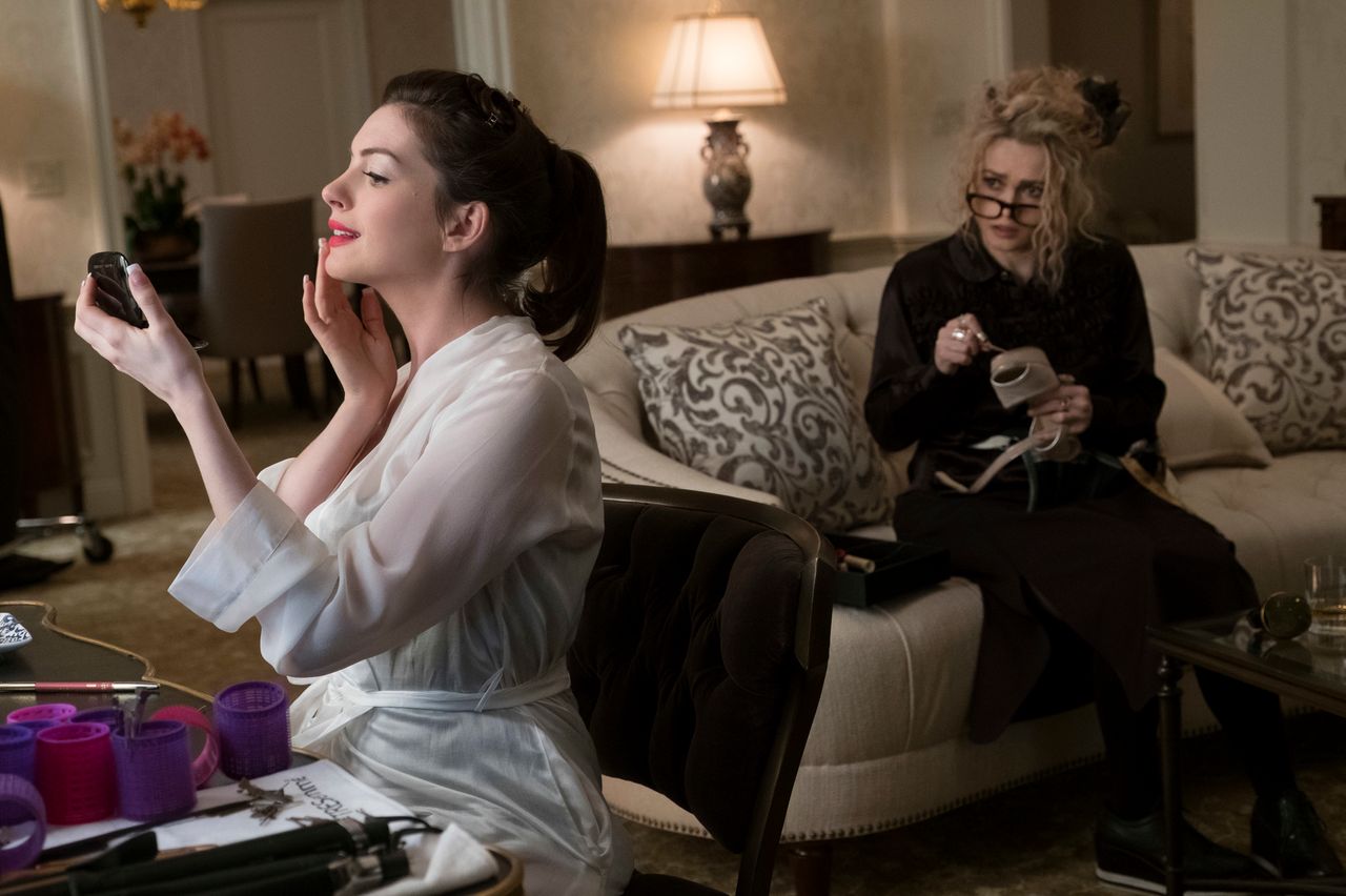 Hathaway doing her own makeup for the damn Met Gala while Bonham-Carter (like all of us) looks on aghast.