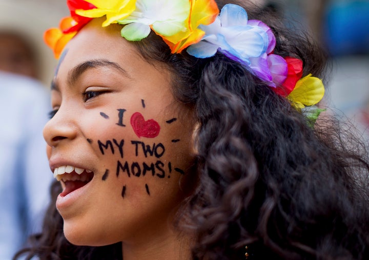 Sidney Plummer cheers during the San Francisco Gay Pride Festival on June 29, 2014.