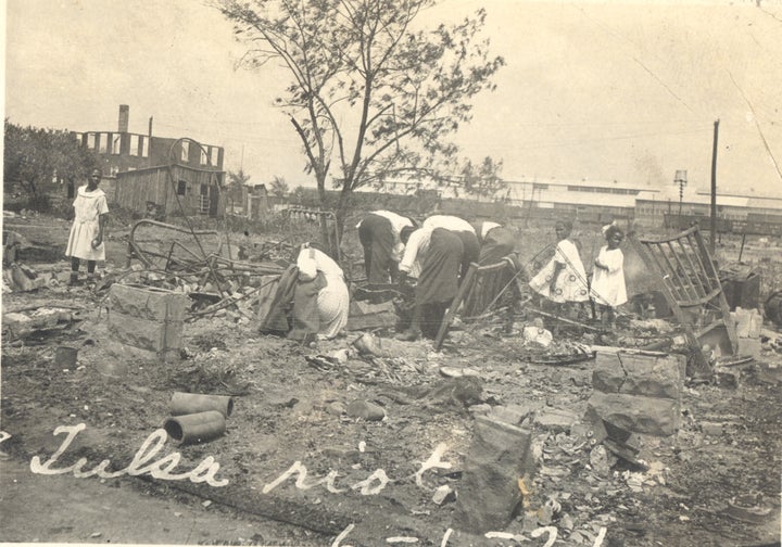 Black residents search through rubble after the Tulsa Race Riot of June 1921.