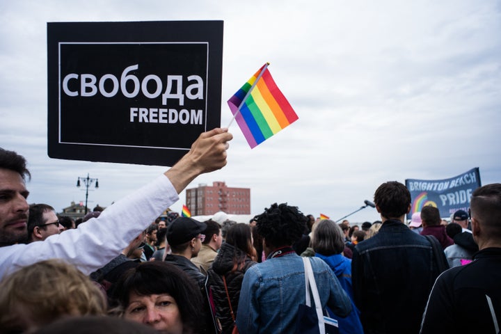 Participants in Brighton Beach Pride walk down the boardwalk in 2017.