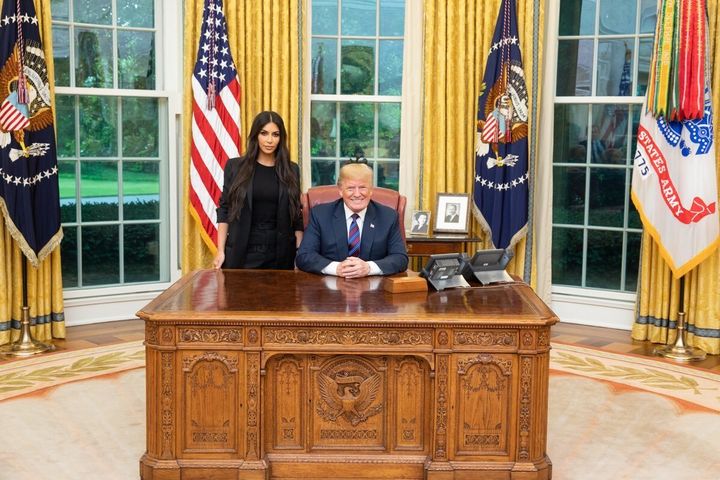 Kim Kardashian West appears in a photo with Donald Trump at the White House during a trip to discuss prison reform.