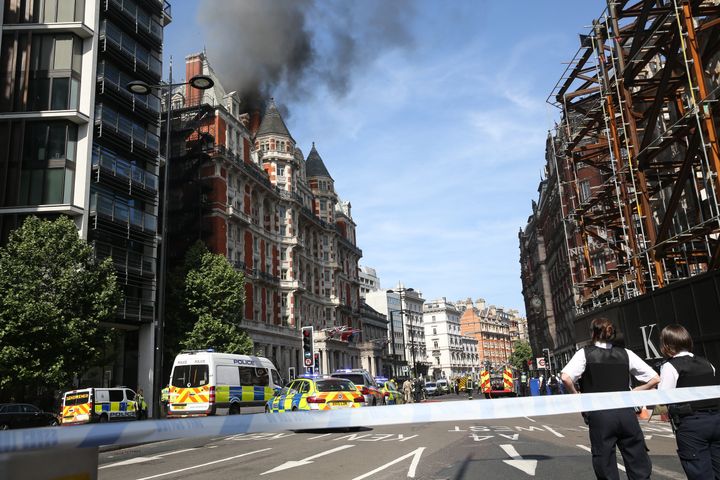 Smoke billowed from the Mandarin Oriental Hotel after a fire broke out on Wednesday