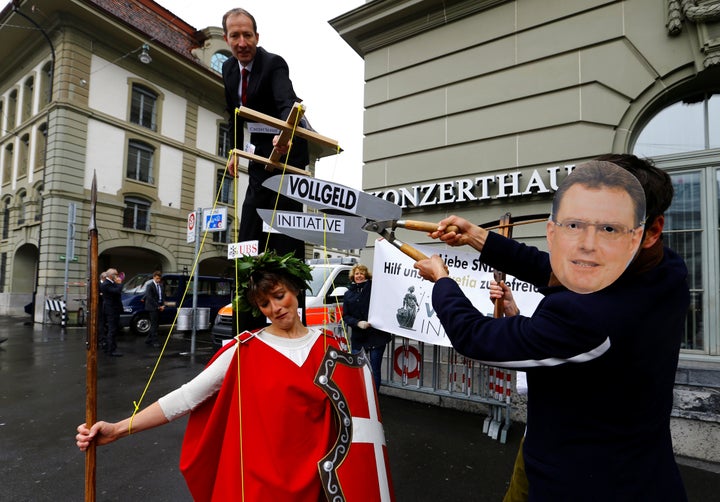 A demonstration promoting a switch to a sovereign money system, outside the Swiss National Bank offices in Bern in April 2017.