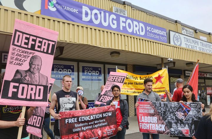 Protesters gathered at Ford's campaign headquarters in Etobicoke, Ontario, on June 2.