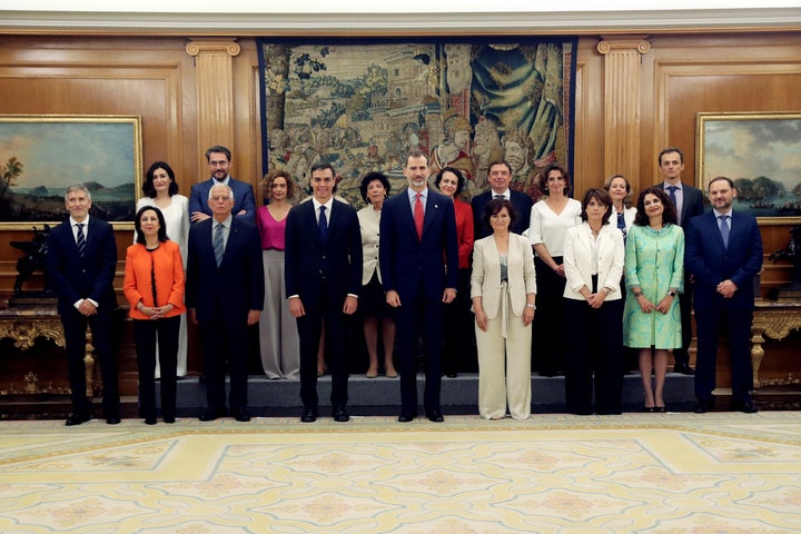 Spain's new cabinet members stand with King Felipe during a swearing-in ceremony at the Zarzuela Palace outside Madrid, Spain, on June 7.