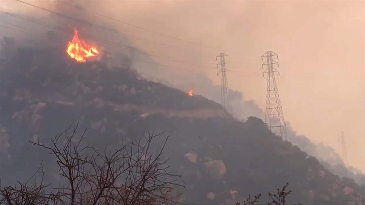 Spot fires burn near power lines in Santa Barbara, California, in December. Wildfires in Ventura and Santa Barbara counties t