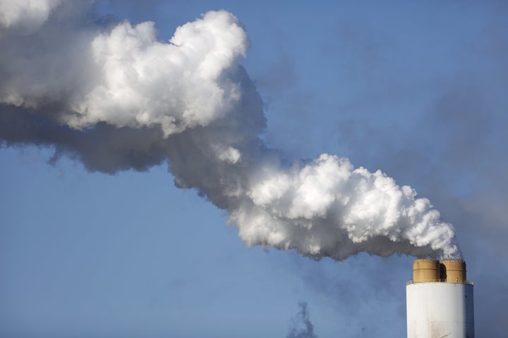 Emissions rise from the coal-fired Santee Cooper Cross Generating Station in Pineville, South Carolina.