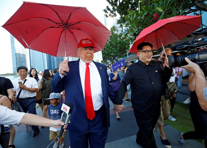 Donald Trump impersonator, Dennis Alan, pictured with an impersonator of Kim Jong Un in Singapore today