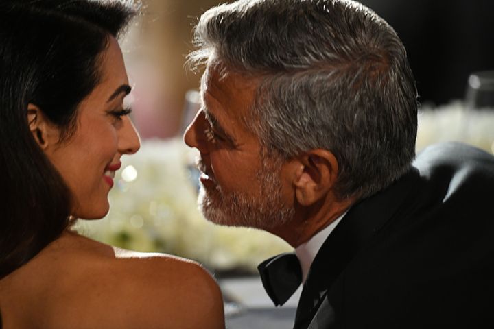 "He is the person who has my complete admiration and also the person whose smile makes me melt every time," Amal Cooney said of husband George on Thursday night.