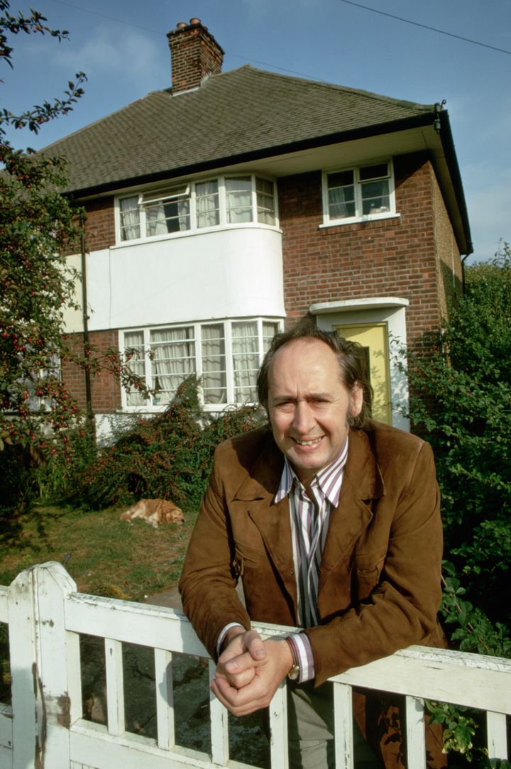 Novelist JG Ballard outiside his house.