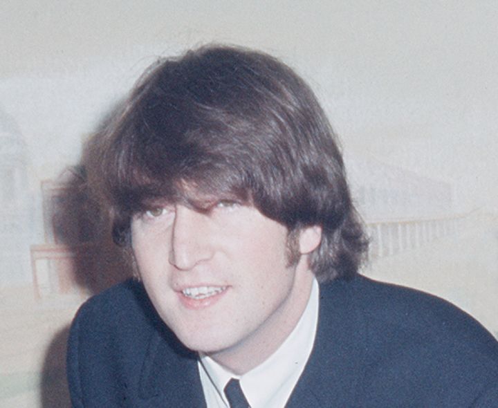 John Lennon at the Saville Theatre after receiving his MBE from the Queen.
