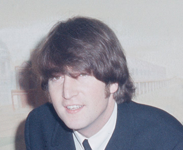 John Lennon at the Saville Theatre after receiving his MBE from the Queen.