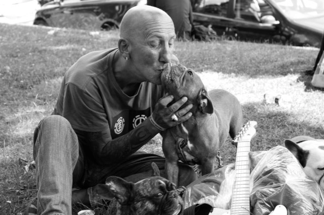 A man and his dog in the aftermath of the fire.