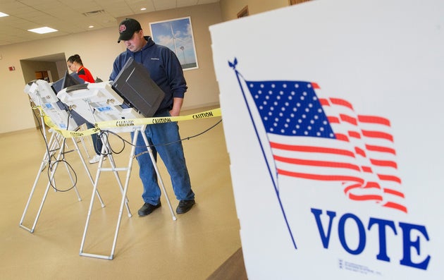 Voters cast their ballots at a polling place in Fowler, Indiana, in the May 3, 2016,