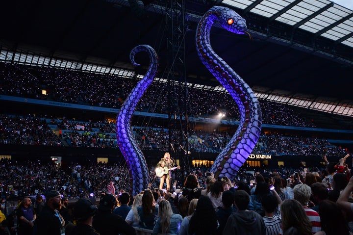 Taylor's staging features two giant snakes