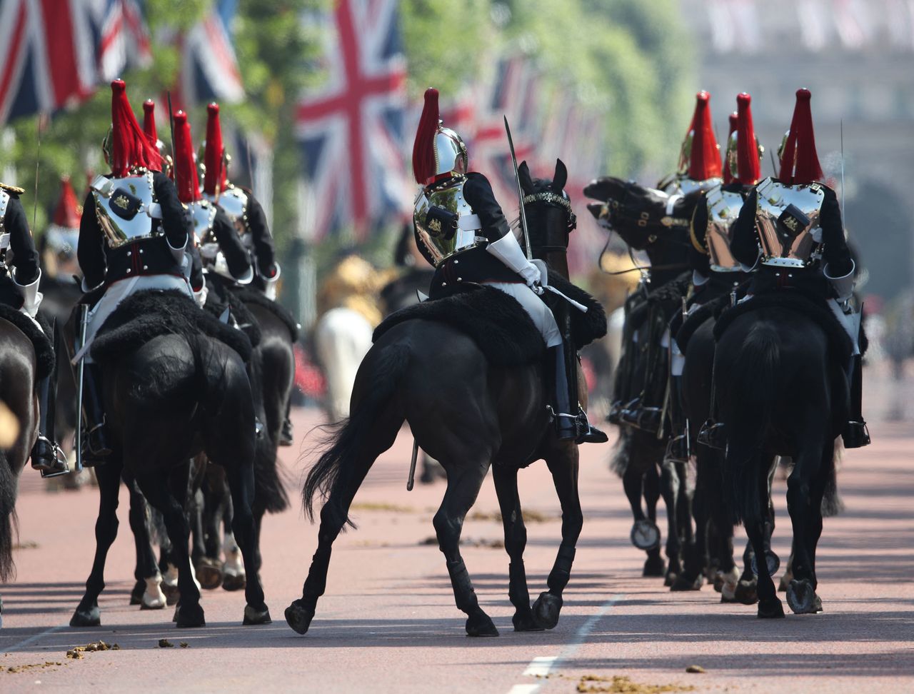 Members of the Household Cavalry on The Mall on their way to Horse Guards Parade.