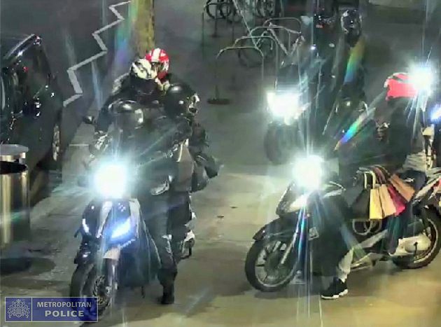 A police handout of a moped gang that robbed a designer ship in west London - there has been a surge of moped related crimes in London