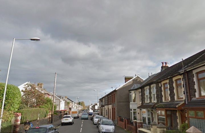 Brithweunydd Road in south wales has been closed off after a child was found death on Friday night