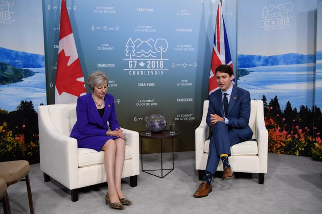 British Prime Minister Theresa May meets with Canadian Prime Minister Justin Trudeau on the first day of the G7 Summit