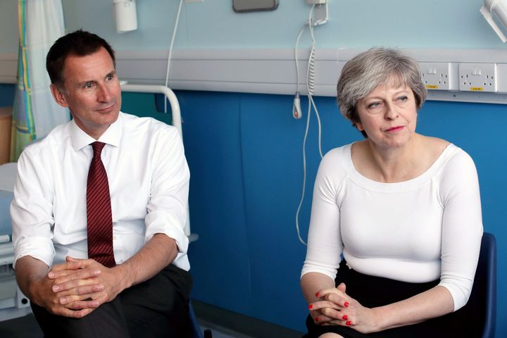 Prime Minister Theresa May and Health Secretary Jeremy Hunt speak to patients during a round table discussion as she visits the Renal Transplant Unit at the Royal Liverpool University Hospital