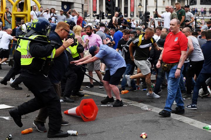 <strong>Demonstrators clash with police during rhe 'Free Tommy Robinson' protest on Whitehall</strong>