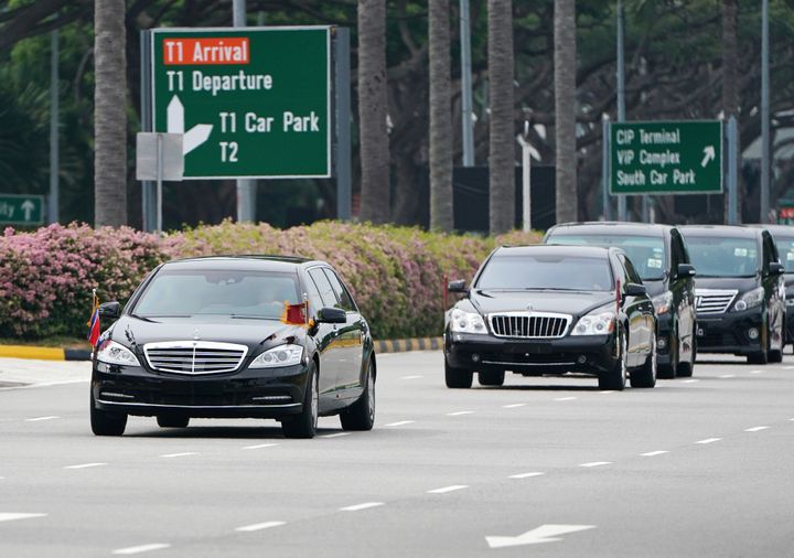 A motorcade believed to be carrying North Korea leader Kim Jong Un travels from the airport to the St. Regis Hotel in Singapore on Sunday.