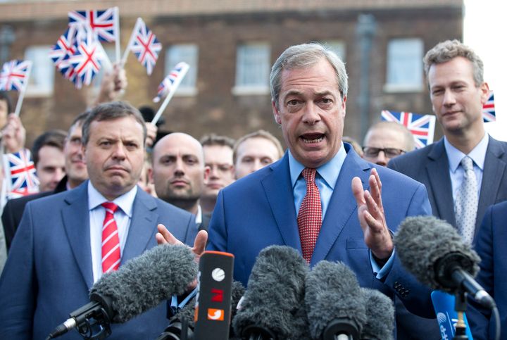 Leader of UKIP Nigel Farage, supported by Arron Banks (L), gives a press conference at College Green, Westminster, after UK votes to leave European Union in historic referendum on June 24th.