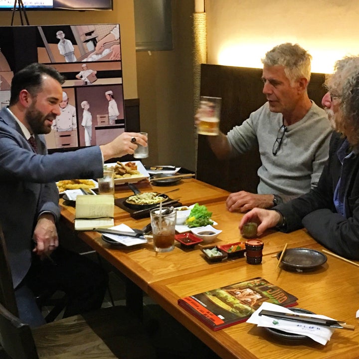 Toasting Anthony Bourdain and writer Joel Rose at a 2015 event for “Get Jiro! Blood and Sushi” in New York City.