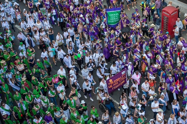 People take part in the mass participation artwork 'Processions' to celebrate 100 years of votes for women.