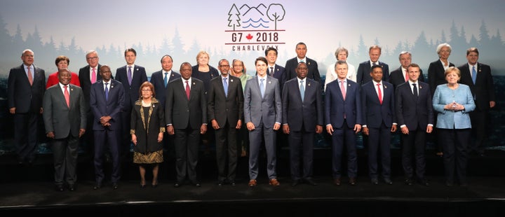 Heads of State gather for a family photo during the G7 Outreach summit in La Malbaie, Quebec.