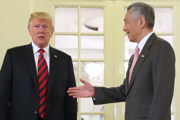 Trump with Singapore's Prime Minister Lee Hsien Loong who is hosting the summit.