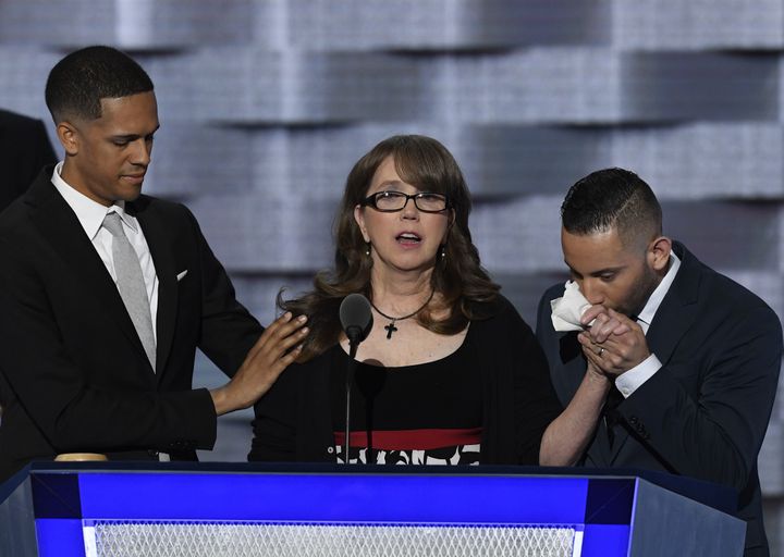Brandon Wolf appears onstage at the the Democratic National Convention alongside Christopher Leinonen's mother and fellow survivor Jose Arriagada.