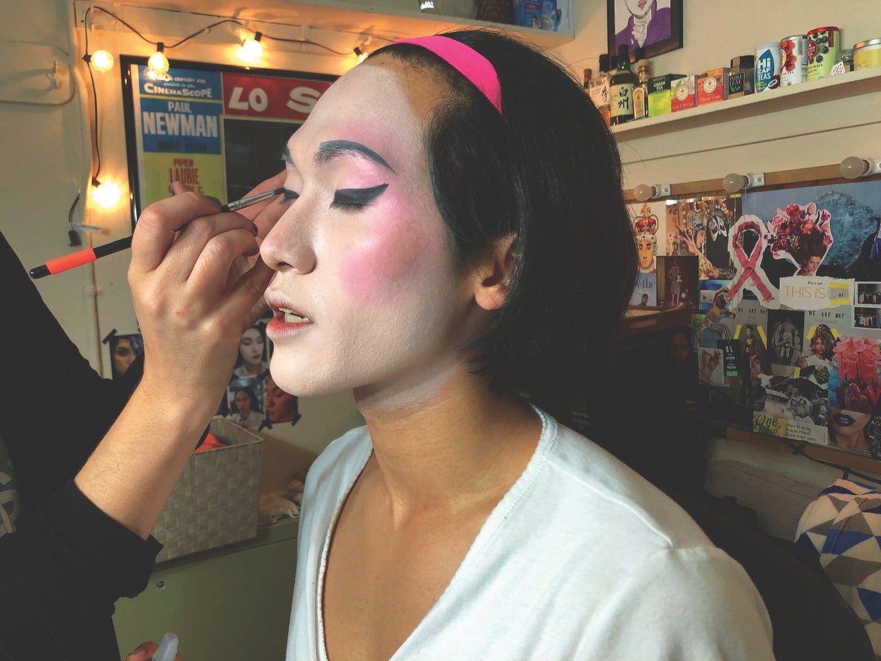 Jin Ha prepares for a performance of "M. Butterfly," in which he plays a male spy disguised as a female opera singer.