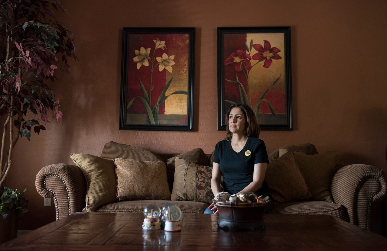 Claudia Ramos, a guest room attendant at the Paris, at her home in Las Vegas. Ramos has taken leaves of absence from her job to work on political and organizing campaigns.