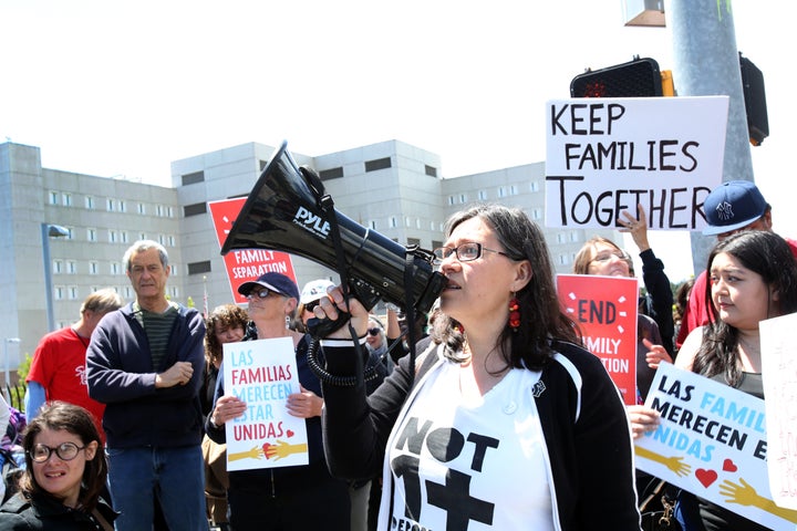 Protesters gather outside a federal detention center holding migrant women on June 9 in SeaTac, Washington.