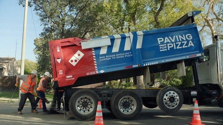 Domino&rsquo;s is offering to fill "cracks, bumps and potholes" to smooth road conditions. The initiative is aimed at "saving