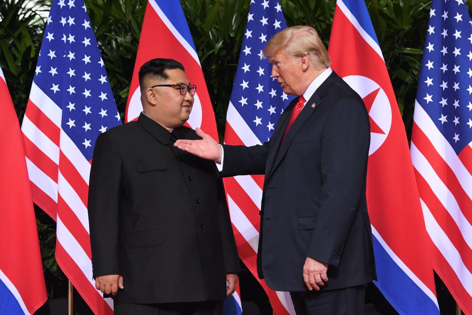 U.S. President Donald Trump gestures as he meets with North Korean leader Kim Jong Un at the start of their historic U.S.-Nor