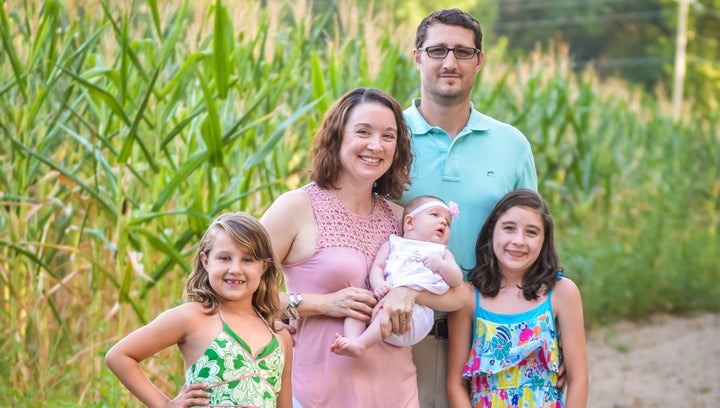 Reagan Wright, 13 (right), with her family in Lexington, South Carolina, parents Joe and Emily, sister Macy and baby sister B