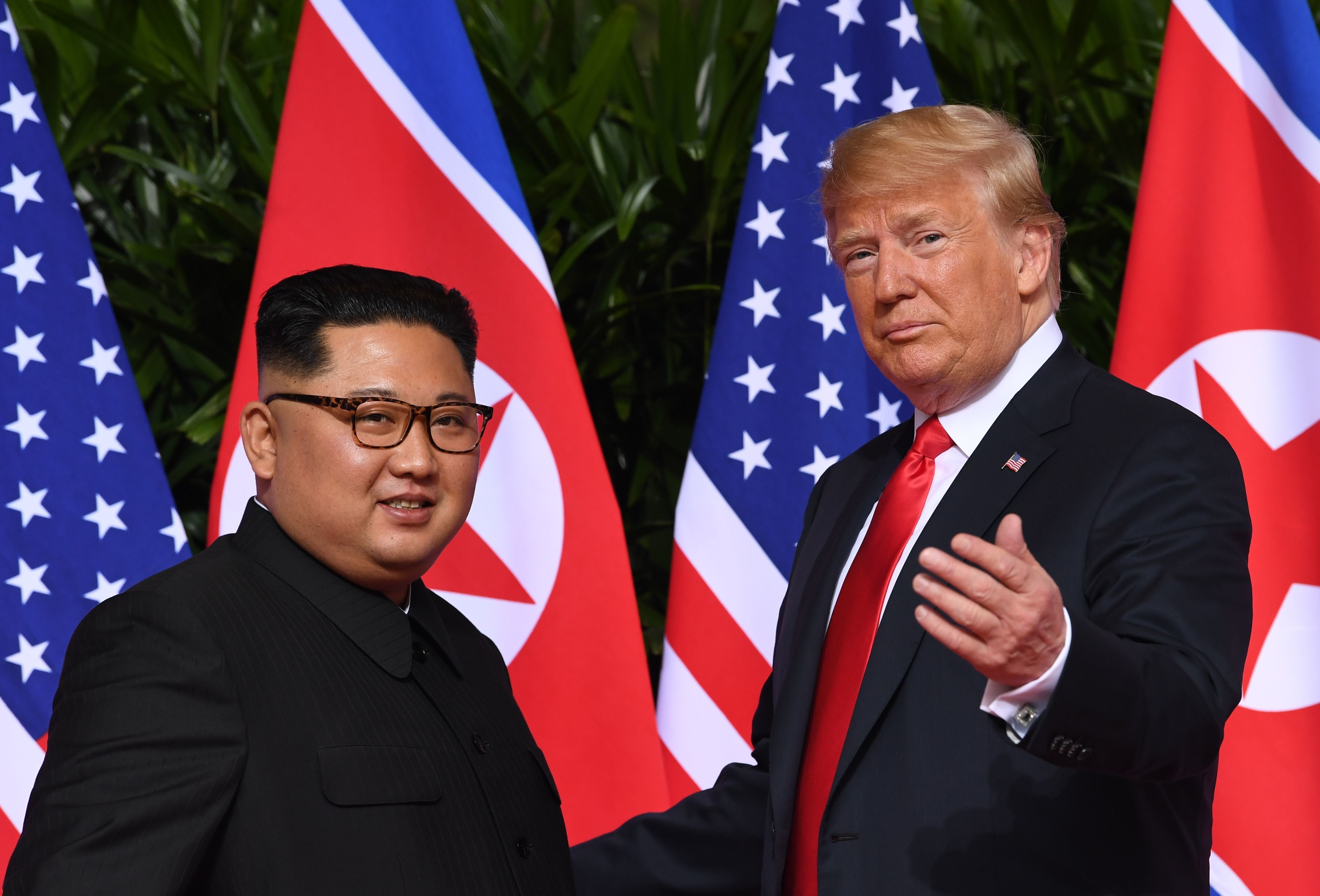 North Korea’s leader Kim Jong Un and U.S. President Donald Trump at the start of their summit in Singapore