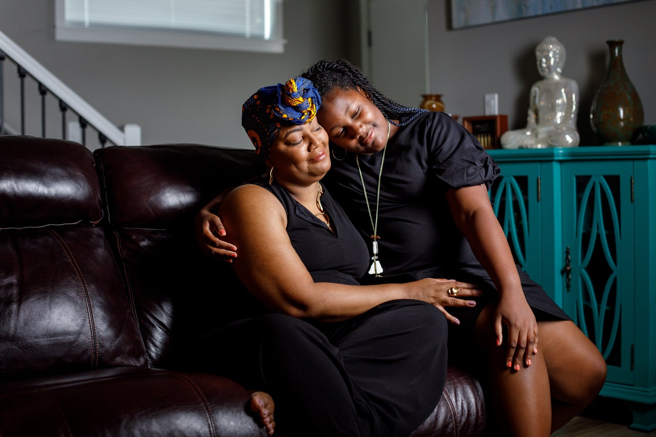 Tai Harden-Moore with her daughter Leia Moore, 11, who is named for the nurse that helped save her life.